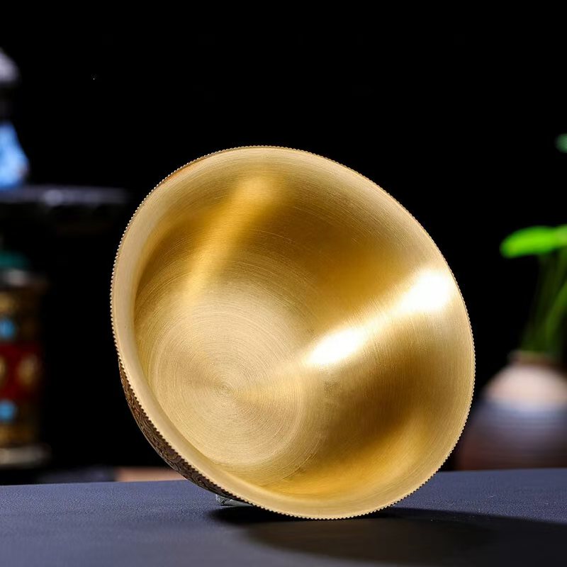Buddhist sacrificial items art: Sacred Ashtamangala engraved altar bowls, designed to accumulate merit and purify karma through water offerings.
