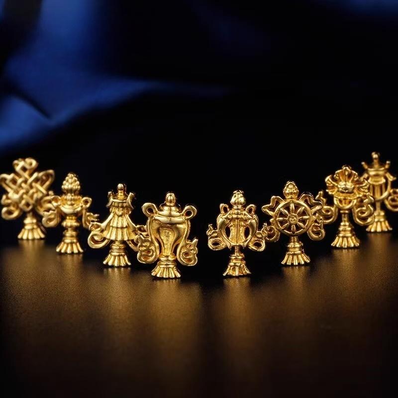Exquisite Buddhist sacrificial items art piece, a set of hand-carved pure silver symbols reflecting the sacred heritage and fine metalwork of Tibetan Buddhist sacrificial implements culture.