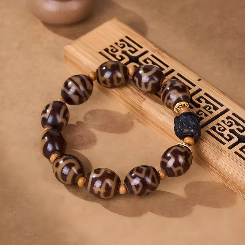 Handcrafted Drolma Lha Dzi bracelet representing comprehensive achievement in Buddhist sacrificial items art and ancient Tibetan traditions.
