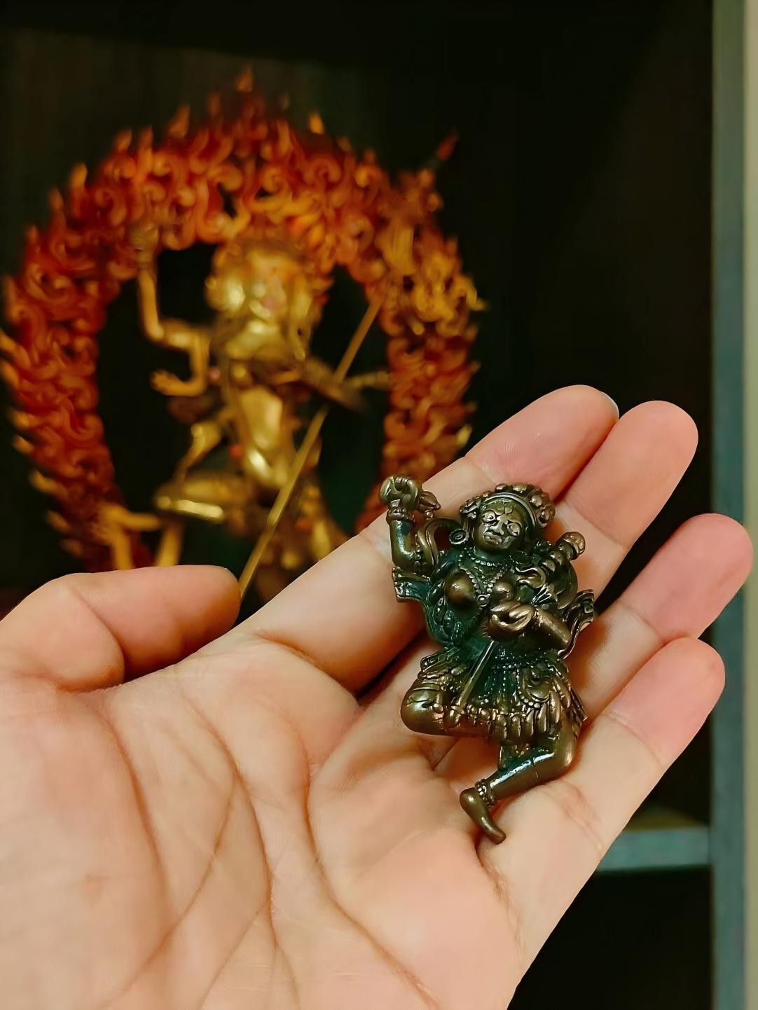 Black Furious Mother iron figure, hand-carved in Tibetan Buddhist sacrificial implements culture, offering protection and wisdom through intricate details and craftsmanship.