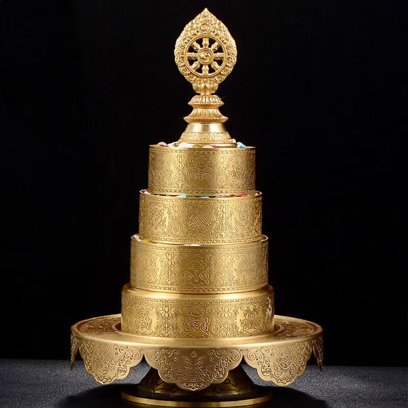 Tibetan Buddhist sacrificial implements culture: A majestic copper mandala set engraved with the Eight Auspicious Symbols for ritual universe offerings. 
