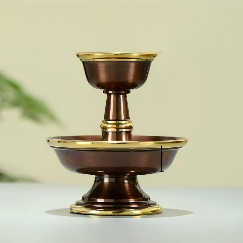 Buddhist sacrificial items art: A hand-engraved brass protector deity cup designed for sacred tea or wine offerings in traditional Tibetan rituals.