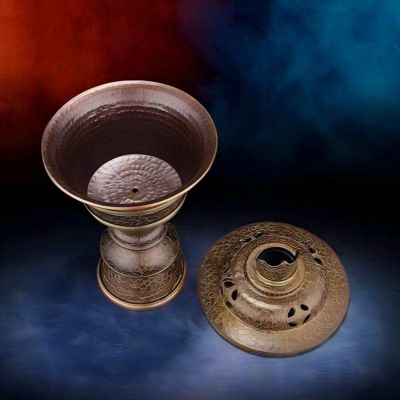  Close-up of a hand-hammered copper ritual lamp, showcasing the intricate Buddhist sacrificial items art and traditional Tibetan Buddhist sacrificial implements culture.