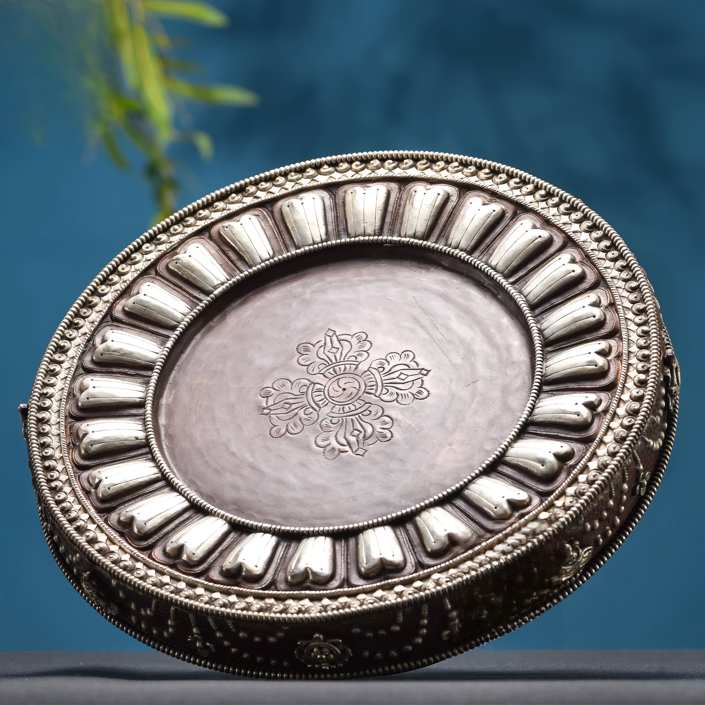Handcrafted Nepalese copper Mandala tray with silver gilding, a Tibetan Buddhist sacrificial implement for rituals and spiritual offerings.