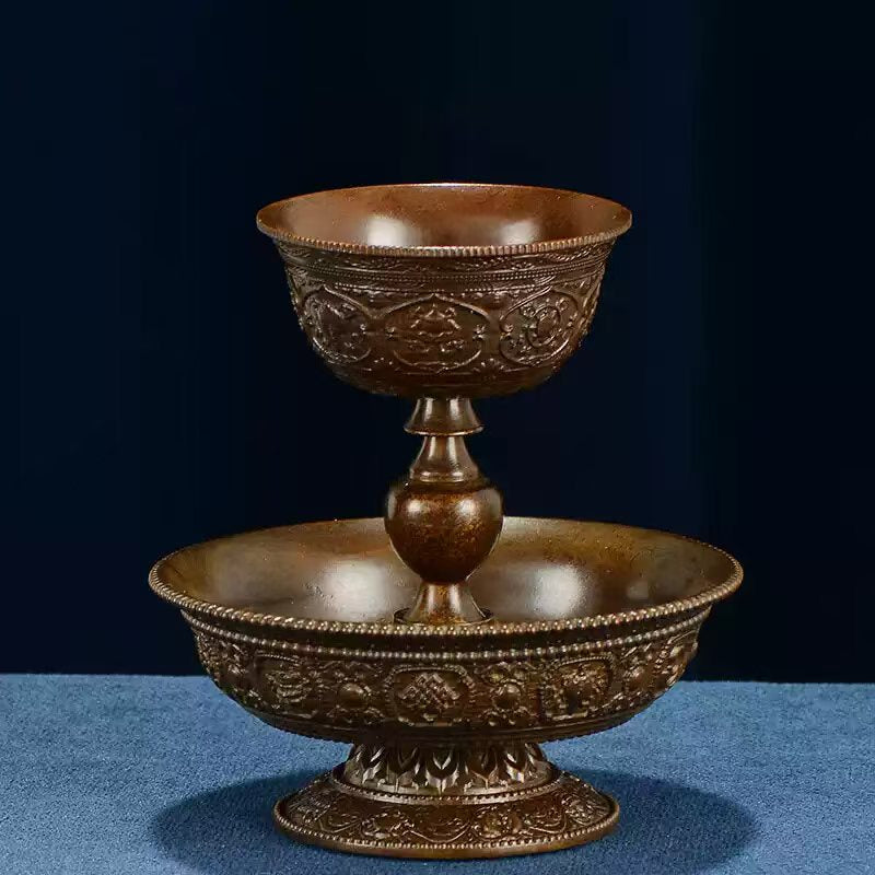 Tibetan Buddhist sacrificial implements culture: Sacred Himalayan high-stemmed ritual vessel, blending spiritual devotion with exquisite gold-plated bronze artistry.