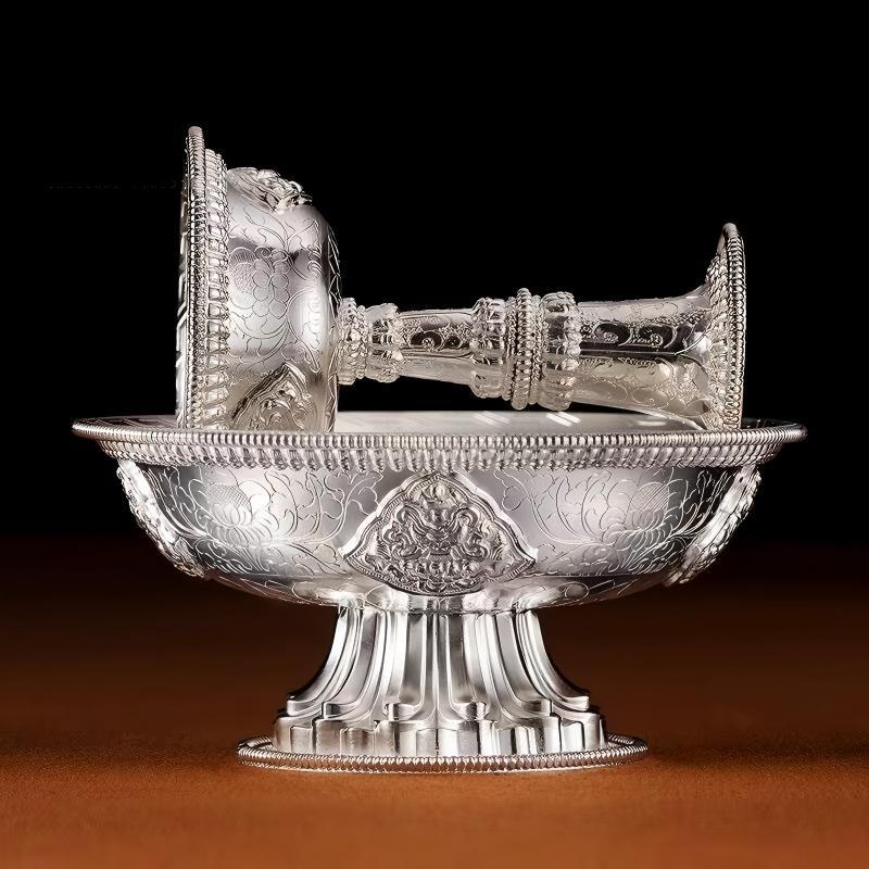 Handcrafted silver Dharma vessel for sacred rituals, blending spiritual Tibetan Buddhist sacrificial implements culture with luxury Buddhist sacrificial items art for practitioners.