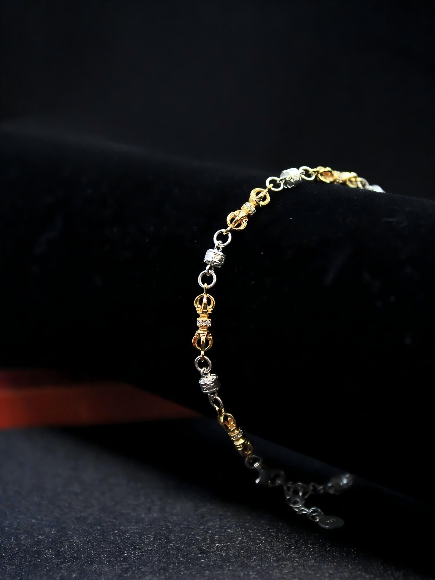 Antique style Sterling Silver Amulet Bracelet inspired by Buddhist sacrificial items art, handcrafted with traditional Tibetan symbols to ward off negative energy.