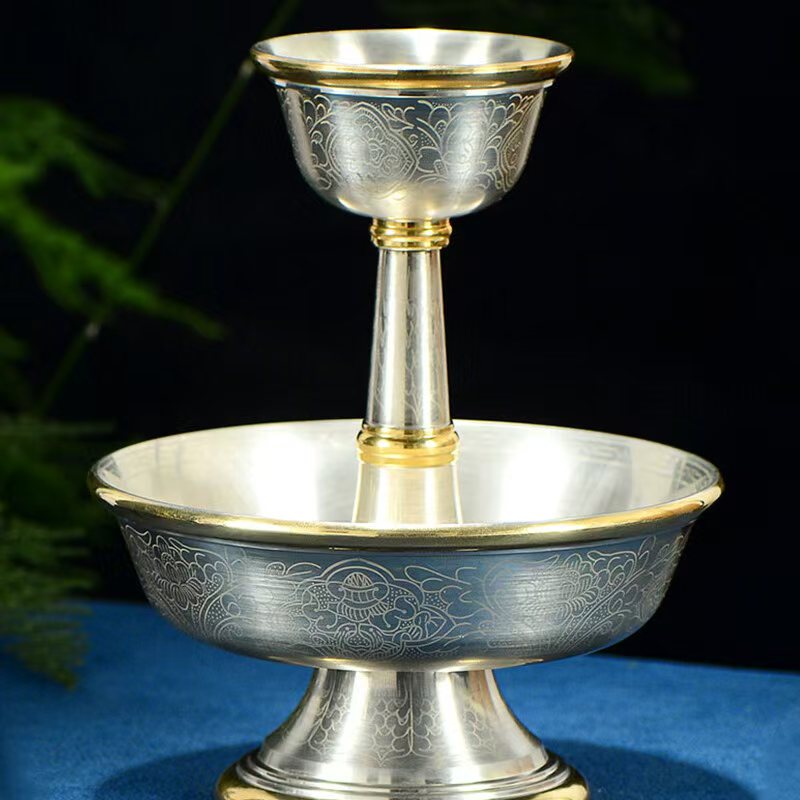 Tibetan Buddhist sacrificial implements culture: Sacred Himalayan ritual vessel featuring the Eight Lucky Emblems, symbolizing divine harmony and victory over obstacles.
