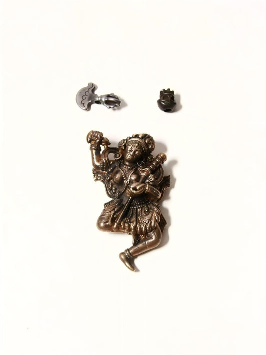 Iron Vajra Haimu Tuo Jia figure, handcrafted in Tibetan Buddhist sacrificial items art, embodying divine protection and spiritual awakening through detailed craftsmanship.