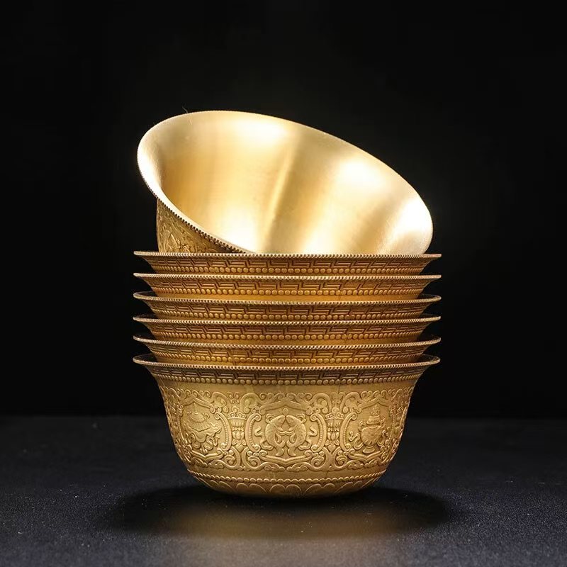 Tibetan Buddhist sacrificial implements culture: Traditional Tibetan brass ritual offering vessels, blending spiritual symbolism with durable polished brass.
