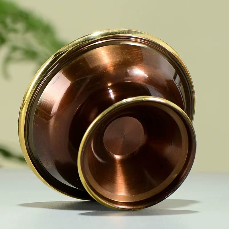 Buddhist sacrificial items art: Traditional Nepal brass ritual offering cup, perfect for creating a solemn and auspicious atmosphere on a home altar.
