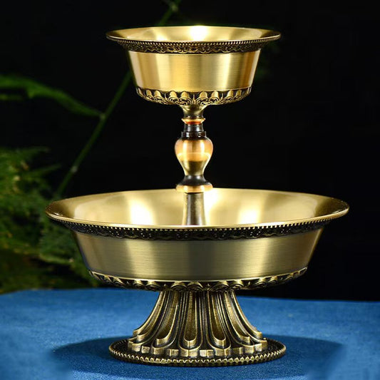 Tibetan Buddhist sacrificial implements culture: Close-up of an artisan-hammered pure copper ritual chalice, showcasing the authentic texture and durability of Buddhist sacrificial items art for daily protection ceremonies.