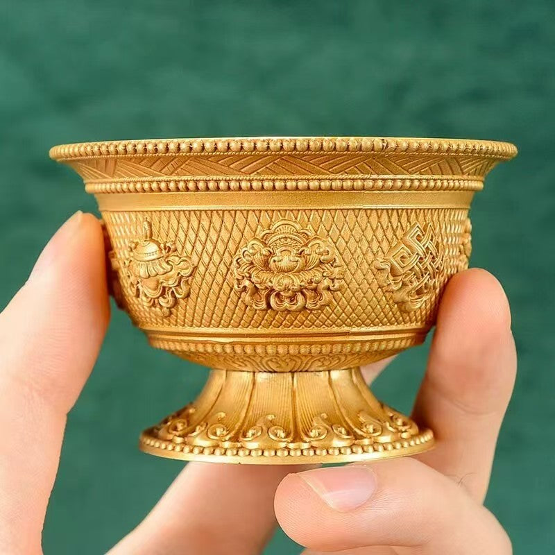 Buddhist sacrificial items art: Sacred simple brass altar bowls, designed to accumulate merit and purify karma through water offerings.