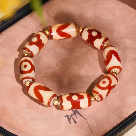 Purely handmade small bucket-shaped red meat agate Dzi beads. A high-value wearable artifact of Tibetan Buddhist sacrificial implements culture.
