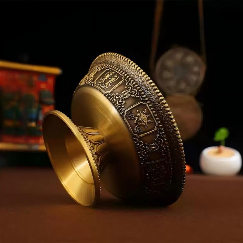 Buddhist sacrificial items art: Traditional Nepal brass ritual offering cup, perfect for creating a solemn and auspicious atmosphere on a home altar.
