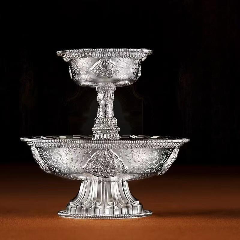  Traditional hand-carved silver Buddhist sacrificial items art used in wrathful deity rituals, showcasing authentic Tibetan Buddhist sacrificial implements culture.