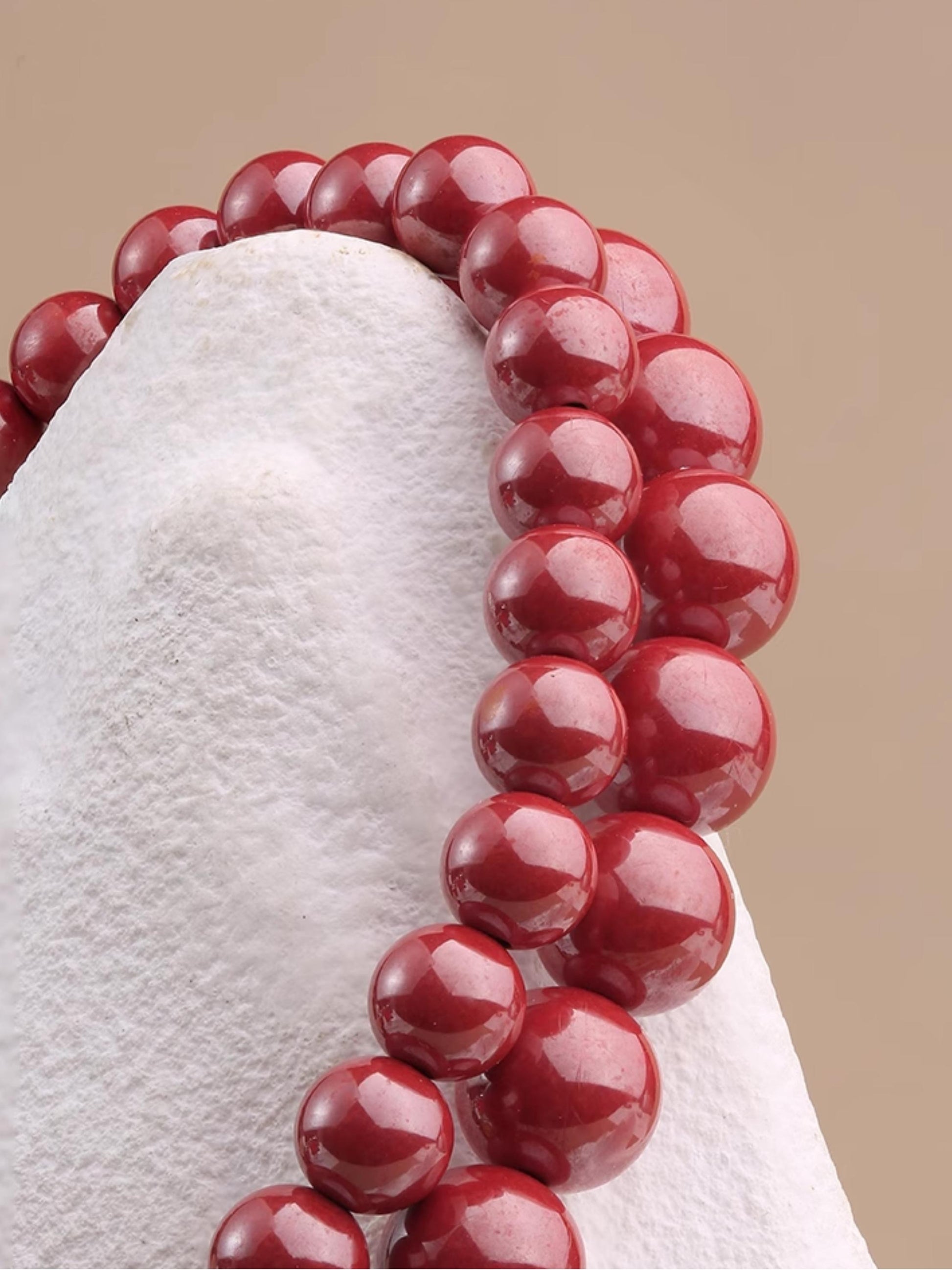 Sacred Red Mala Strand handcrafted from natural cinnabar and agate beads. This Tibetan Buddhist jewelry art embodies traditional protection symbolism.       