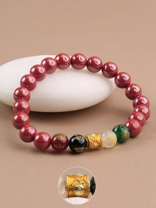 Handmade cinnabar protection mala beads with agate beads and copper details. This Tibetan Buddhist ornament art provides energy protection through sacred traditional methods