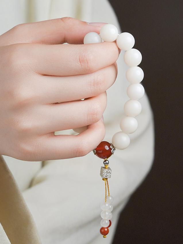 Enlightenment Bodhi Bracelet showcasing traditional Tibetan metalwork details. This Tibetan Buddhist jewelry art promotes spiritual awakening.