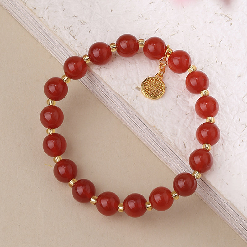 Agate Enlightenment Bracelet featuring traditional Tibetan silver work and lapis lazuli accents. This jewelry art piece promotes spiritual awakening through sacred geometry.