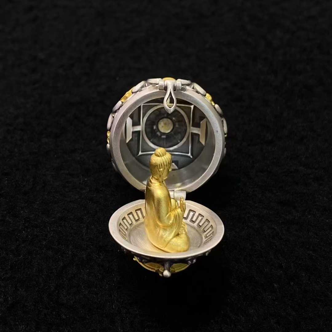 Tibetan Buddhist jewelry culture showcased in a S925 silver pendant featuring Shakyamuni Buddha surrounded by the sacred Eight Auspicious Symbols (Ashtamangala), representing the path to enlightenment.