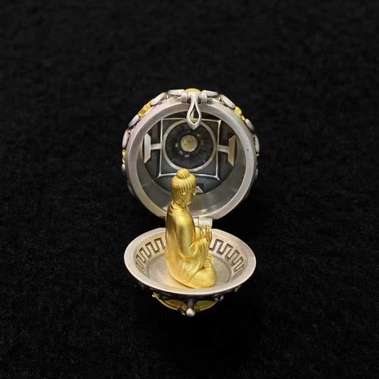 Tibetan Buddhist jewelry culture showcased in a S925 silver pendant featuring Shakyamuni Buddha surrounded by the sacred Eight Auspicious Symbols (Ashtamangala), representing the path to enlightenment.