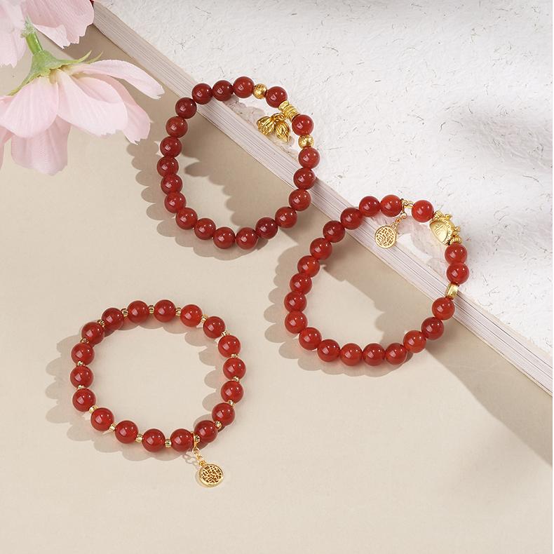 Sacred Stone Agate Strand featuring pure handcrafted agate with copper accents and silver details. This Tibetan Buddhist jewelry art embodies ancient spiritual traditions for meditation practice.