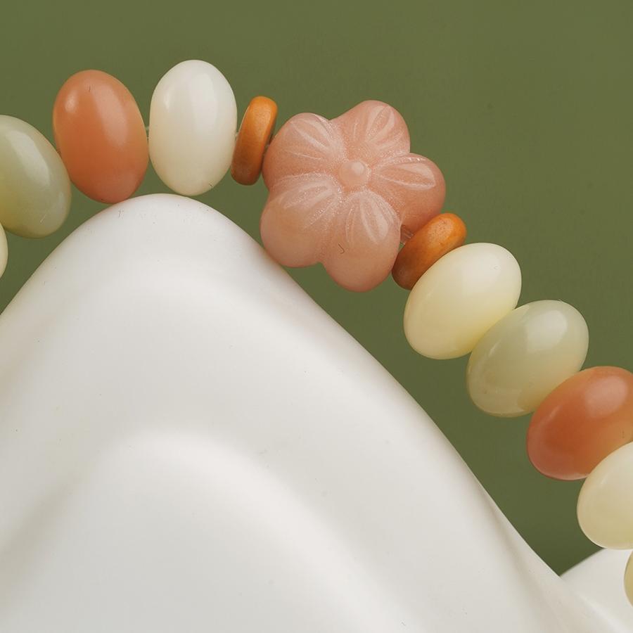 Bodhi multi-loop bracelet handcrafted with 925 silver and jujube wood elements. This Tibetan Buddhist jewelry art piece supports meditation and spiritual growth.