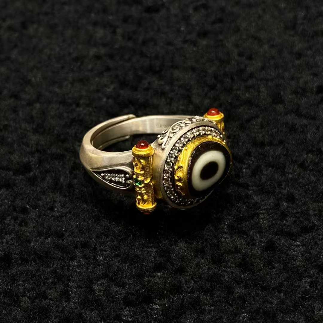 Tibetan Buddhist jewelry culture embodied in a S925 silver vajra ring featuring sacred ritual symbols, representing indestructible wisdom in fine jewelry art.