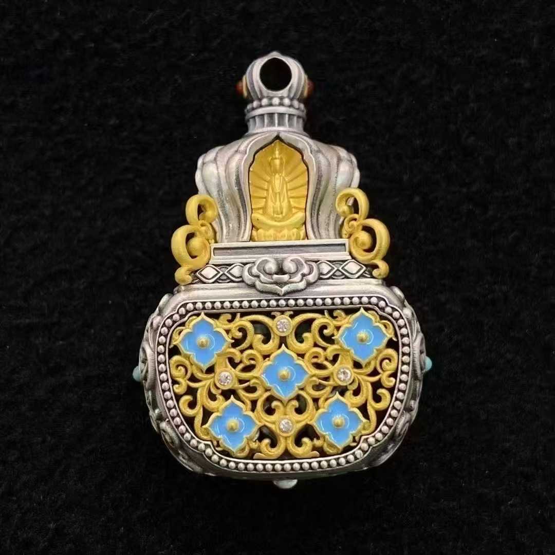 Exquisite Tibetan Buddhist jewelry presenting mandala carved silver aromatherapy lockets. This intricately designed gourd pendant features sacred mandala patterns and functions as a personal aromatherapy diffuser and meditation aid.