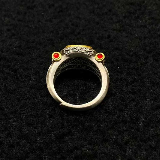 A masterpiece of Tibetan Buddhist jewelry art, this sterling silver dorje ring showcases exquisite inlaid craftsmanship for spiritual practice and protection.