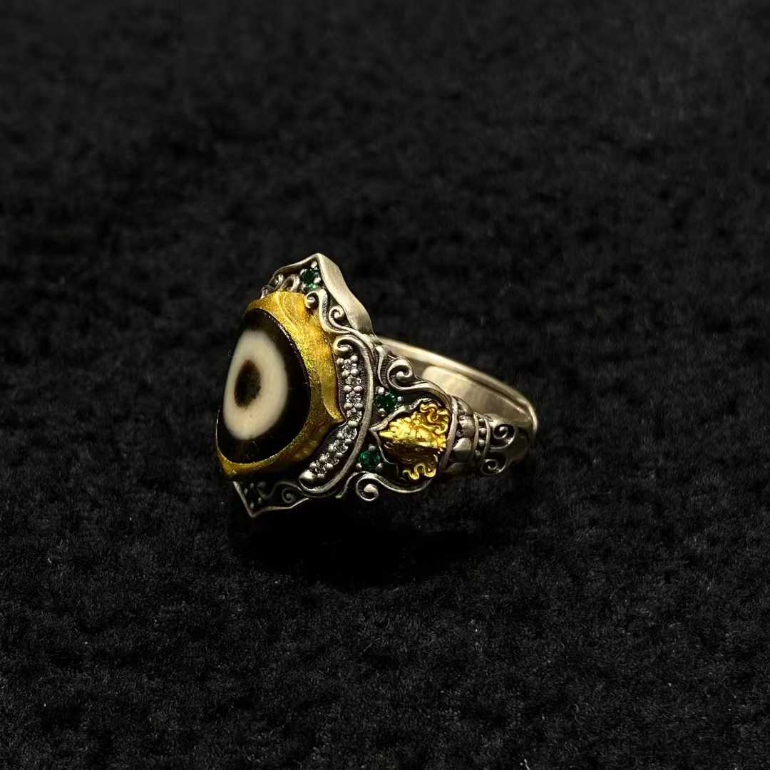 A masterpiece of Tibetan Buddhist jewelry art, this sterling silver meditation ring features Shadakshari Tara with detailed craftsmanship for spiritual practice.