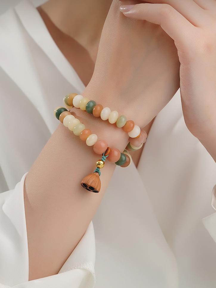 Serene Bodhi meditation strand featuring 925 silver details and natural jujube wood. Handmade following Tibetan Buddhist jewelry art traditions for mindful practice.