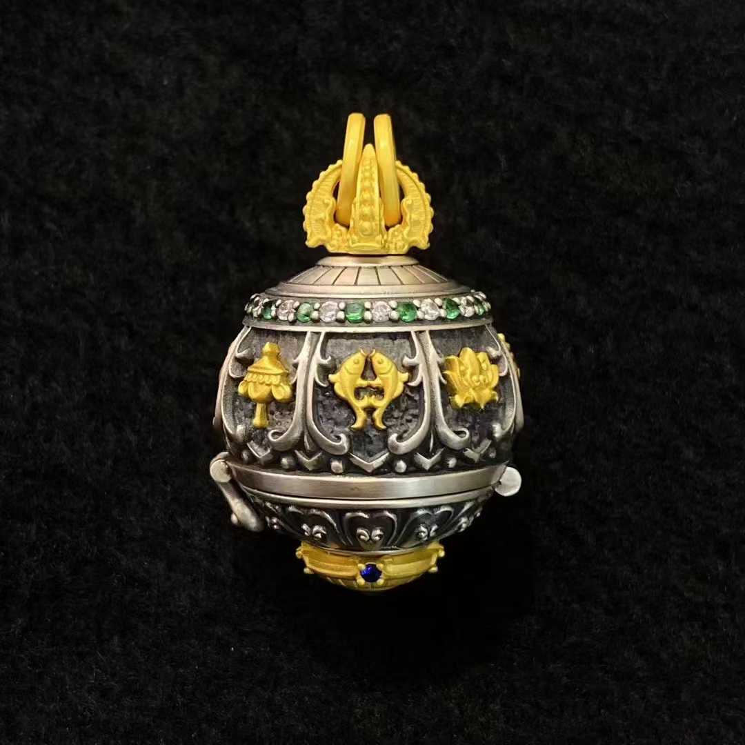  Tibetan Buddhist jewelry art embodied in a 925 silver enlightenment pendant. The design features the eight sacred Buddhist symbols, each representing a different aspect of the Buddha's teachings.