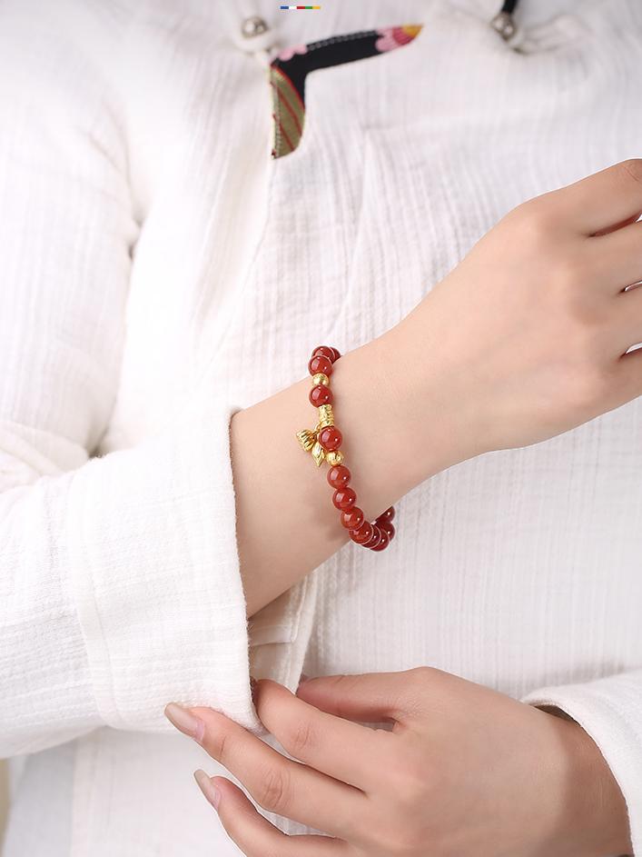 Spiritual Agate Protection Mala handcrafted with traditional silver details and copper ornaments. This Tibetan Buddhist jewelry art provides energetic shielding through sacred craftsmanship.