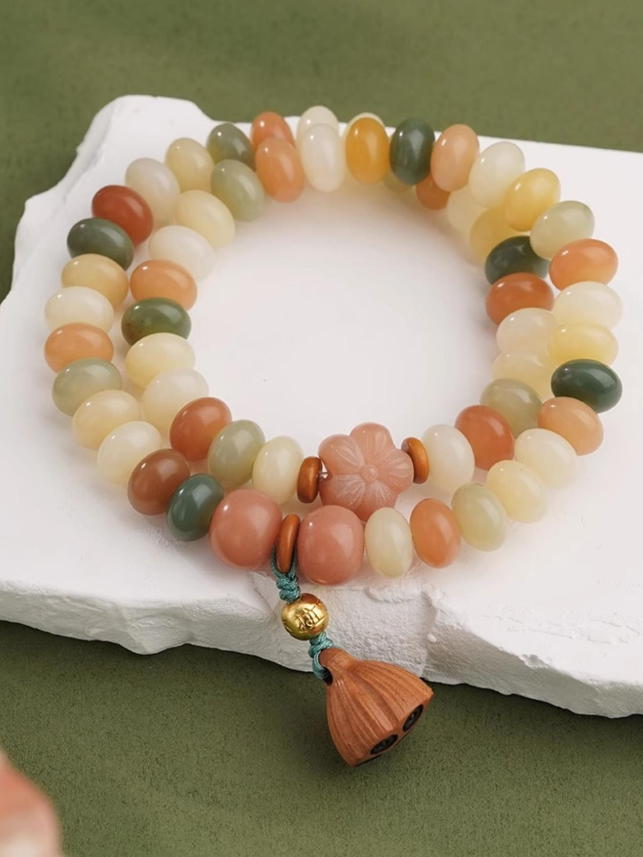 Wisdom Bodhi prayer beads with 925 silver accents and jujube wood spacers. This Tibetan Buddhist jewelry art creation represents ancient wisdom traditions.