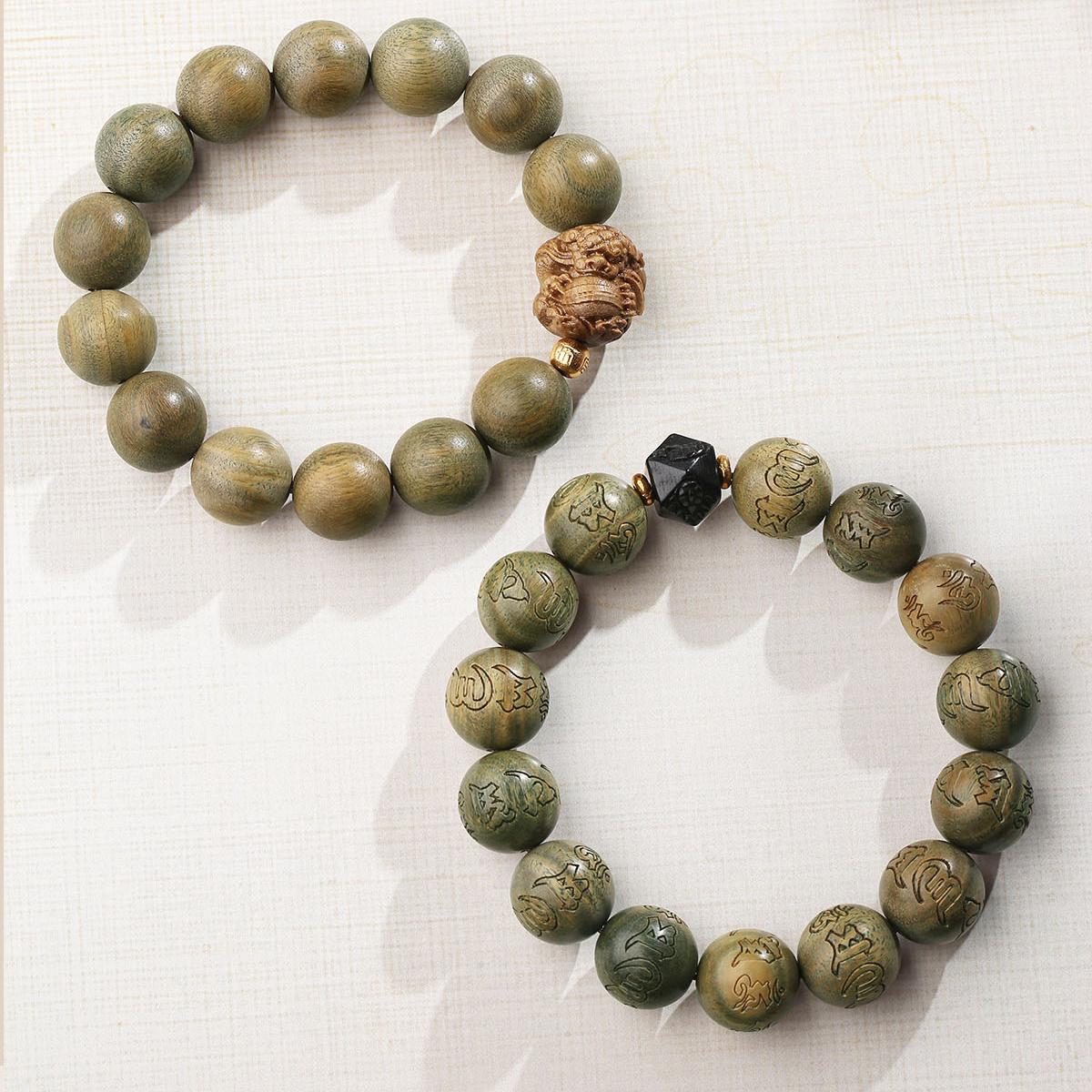 Zen Sandalwood Meditation Bracelet featuring pure handmade green sandalwood beads and protective obsidian accents. This Tibetan Buddhist jewelry art creation supports deep meditation and mindful awareness through its balanced energy design.