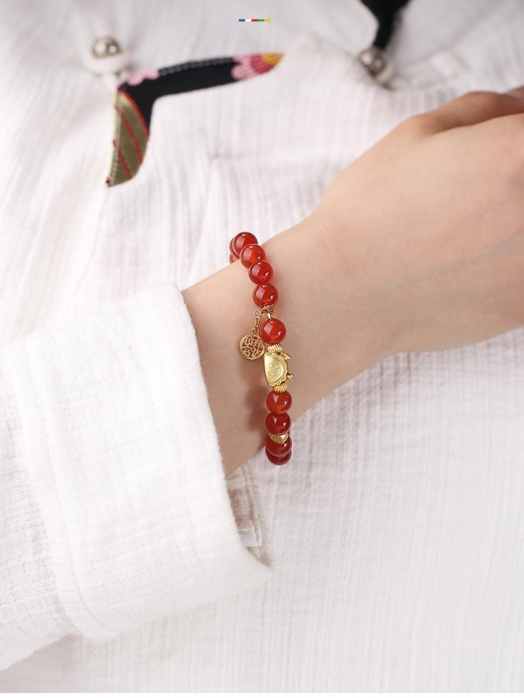 Agate prayer beads strand handcrafted with lapis lazuli spacers and 925 silver details. This Tibetan Buddhist jewelry art piece represents authentic spiritual traditions.