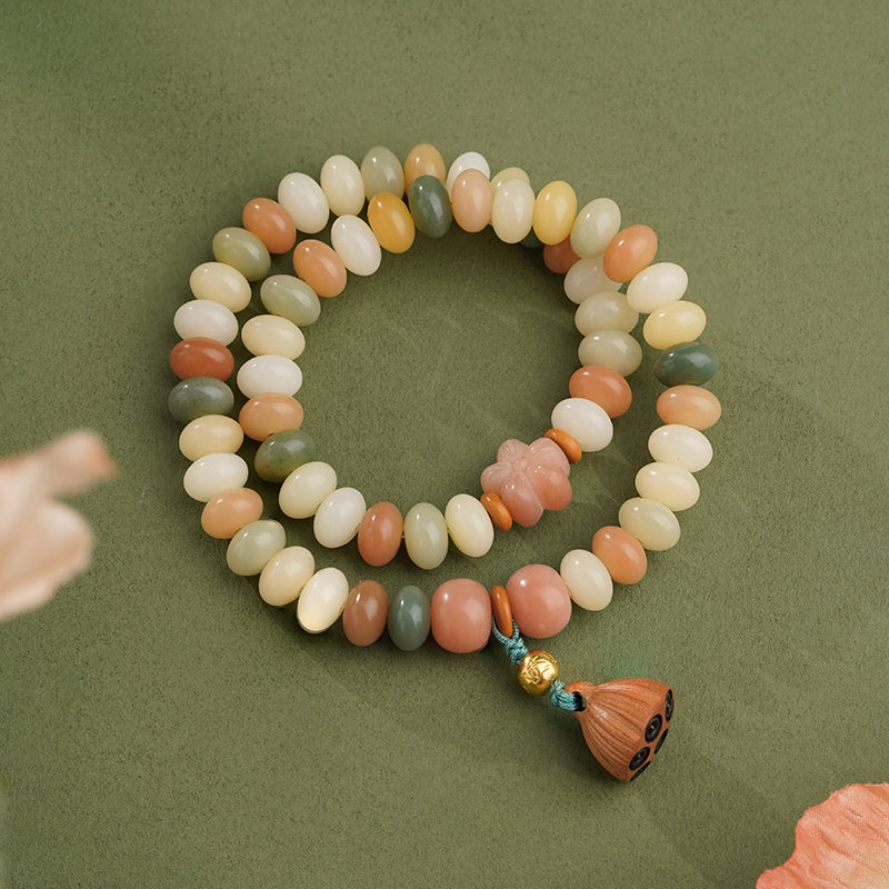 Handmade Tibetan Buddhist multi-strand bracelet featuring natural Bodhi seeds with 925 silver and jujube wood accents. This sacred jewelry art embodies traditional Tibetan craftsmanship for meditation practice.