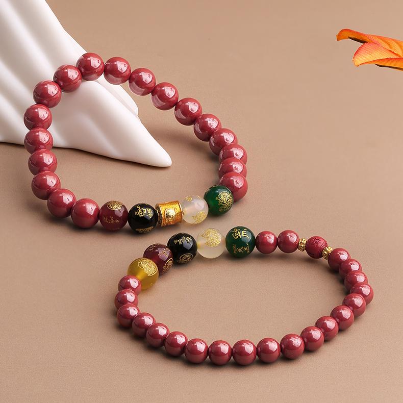 Vermilion Energy Strand featuring handcrafted cinnabar and agate with sacred geometry. This Tibetan Buddhist jewelry art channels protective spiritual forces.
