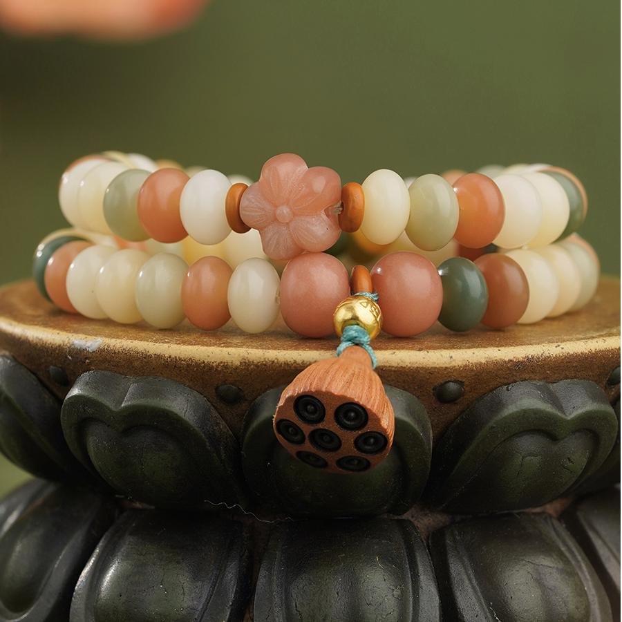 Circular Bodhi enlightenment bracelet with 925 silver ornaments and jujube wood beads. This sacred jewelry art embodies Tibetan Buddhist spiritual values.