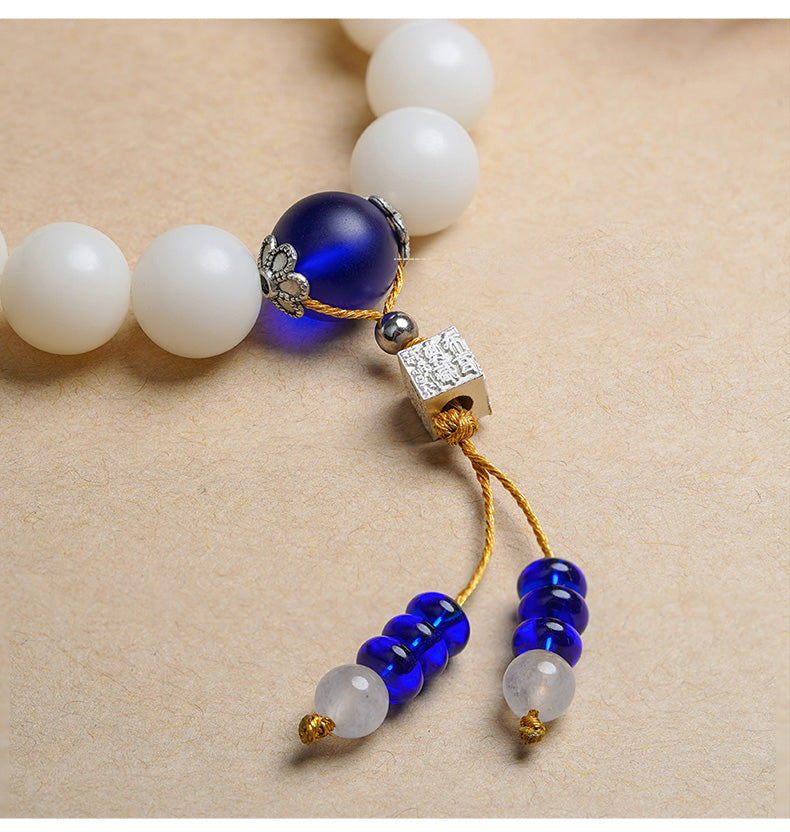 Enlightenment Bodhi Bracelet showcasing traditional lapis lazuli inlay and metalwork. This jewelry culture creation promotes spiritual awakening in Tibetan Buddhist tradition.