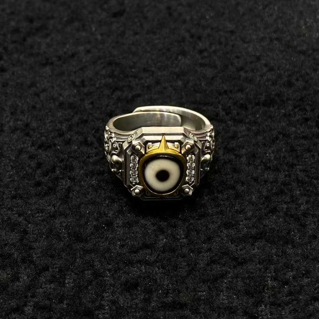 Meticulously inlaid Tibetan Dzi bead ring in S925 silver demonstrates authentic Buddhist jewelry art, carrying centuries of spiritual significance.