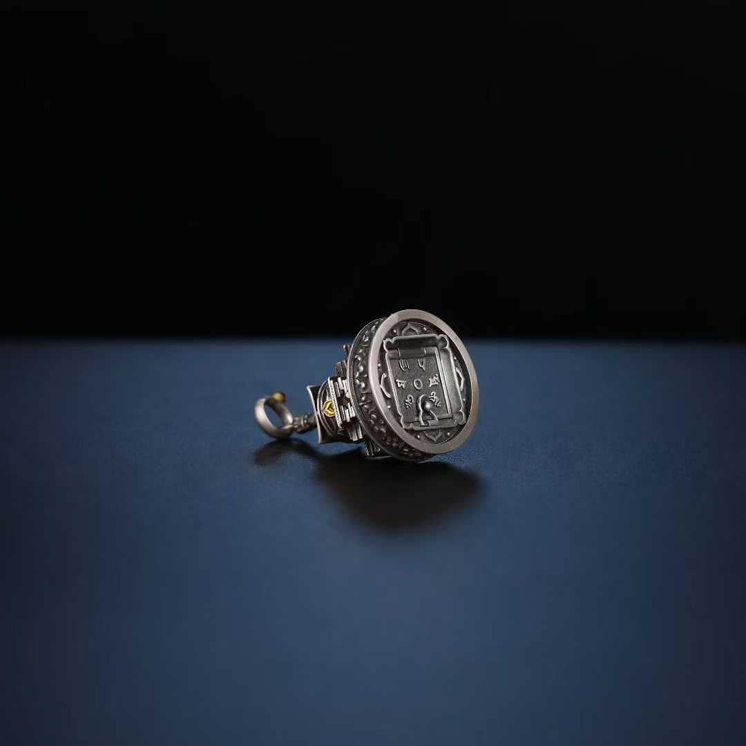 Experience Tibetan Buddhist jewelry culture with this fine-crafted cosmic mandala pendant in S925 silver, depicting the celestial order through sacred spiritual symbolism and jewelry art.