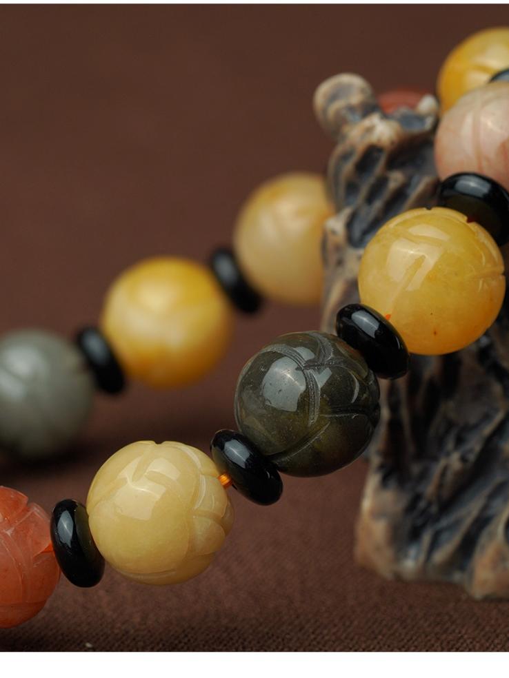 Golden Jade and Obsidian mala representing authentic Tibetan Buddhist jewelry culture. Handmade with round beads and traditional symbols for meditation and spiritual practice.