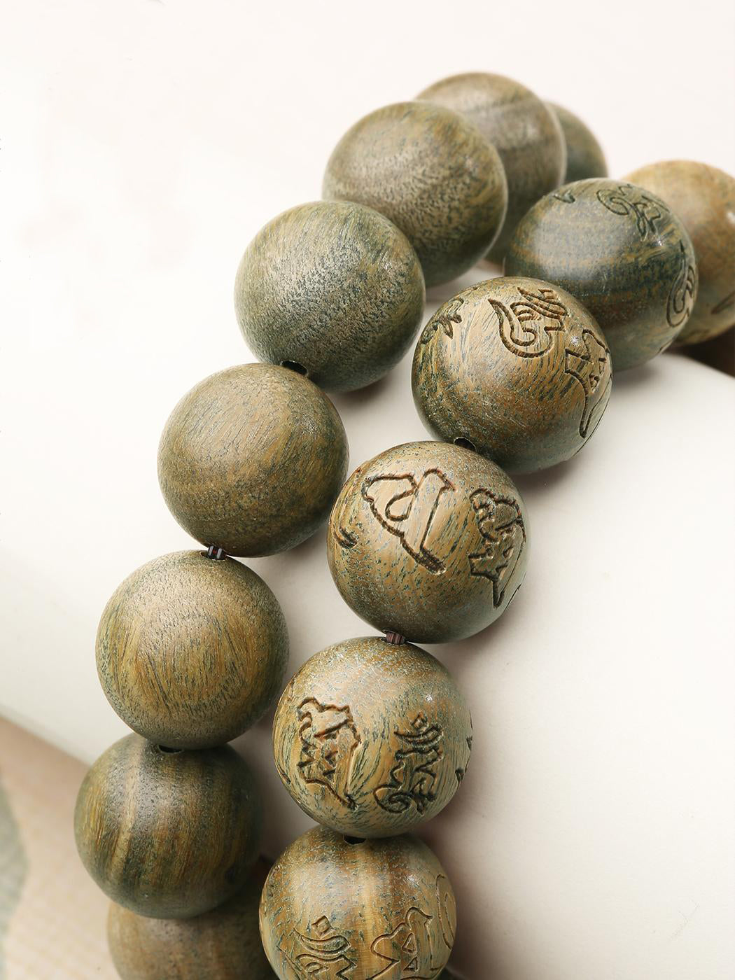 Harmony Sandalwood Prayer Strand combining green sandalwood's serenity with obsidian's grounding properties. This Tibetan Buddhist jewelry culture artwork embodies traditional craftsmanship for daily spiritual practice and energy protection.