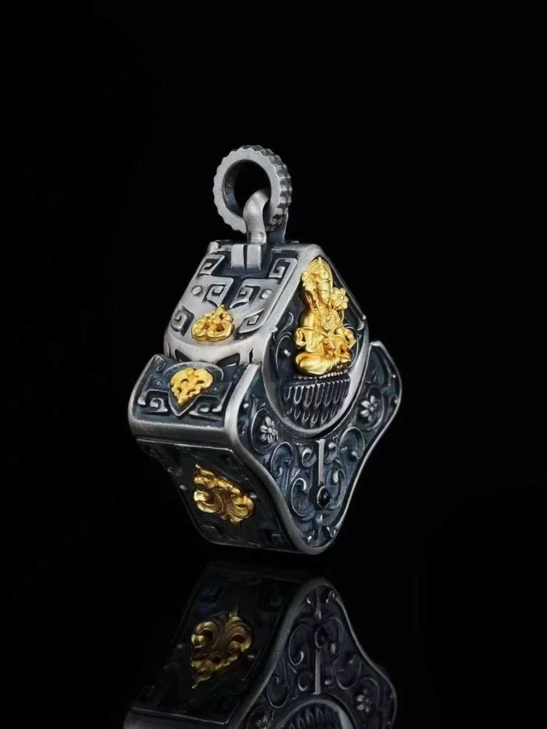 Close-up view of a finely crafted S925 silver Vajrabhairava charm, highlighting the intricate details and spiritual significance of Tibetan Buddhist jewelry art.