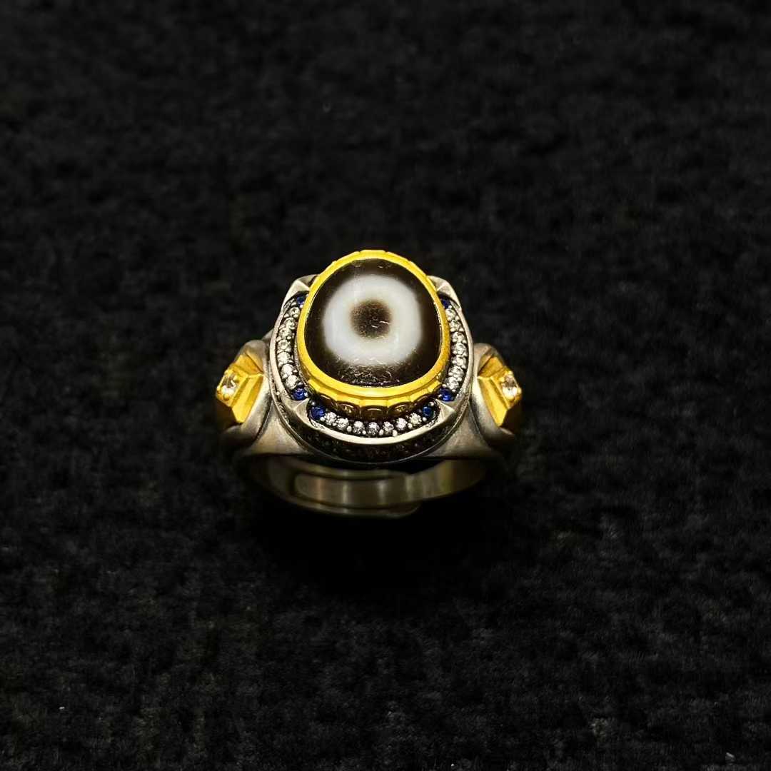 Sacred Morning Star meditation ring with gemstone inlay represents Tibetan Buddhist jewelry culture, combining celestial symbolism with meditation practice.