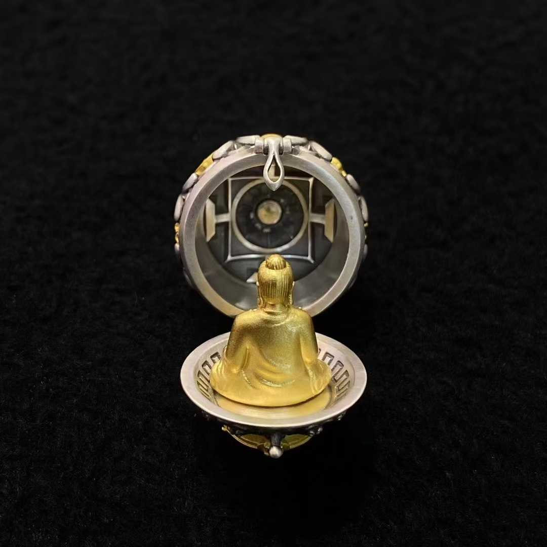 A mastercrafted silver pendant from Tibetan Buddhist jewelry culture, showcasing the Eight Auspicious Symbols in intricate detail for spiritual practitioners and collectors.