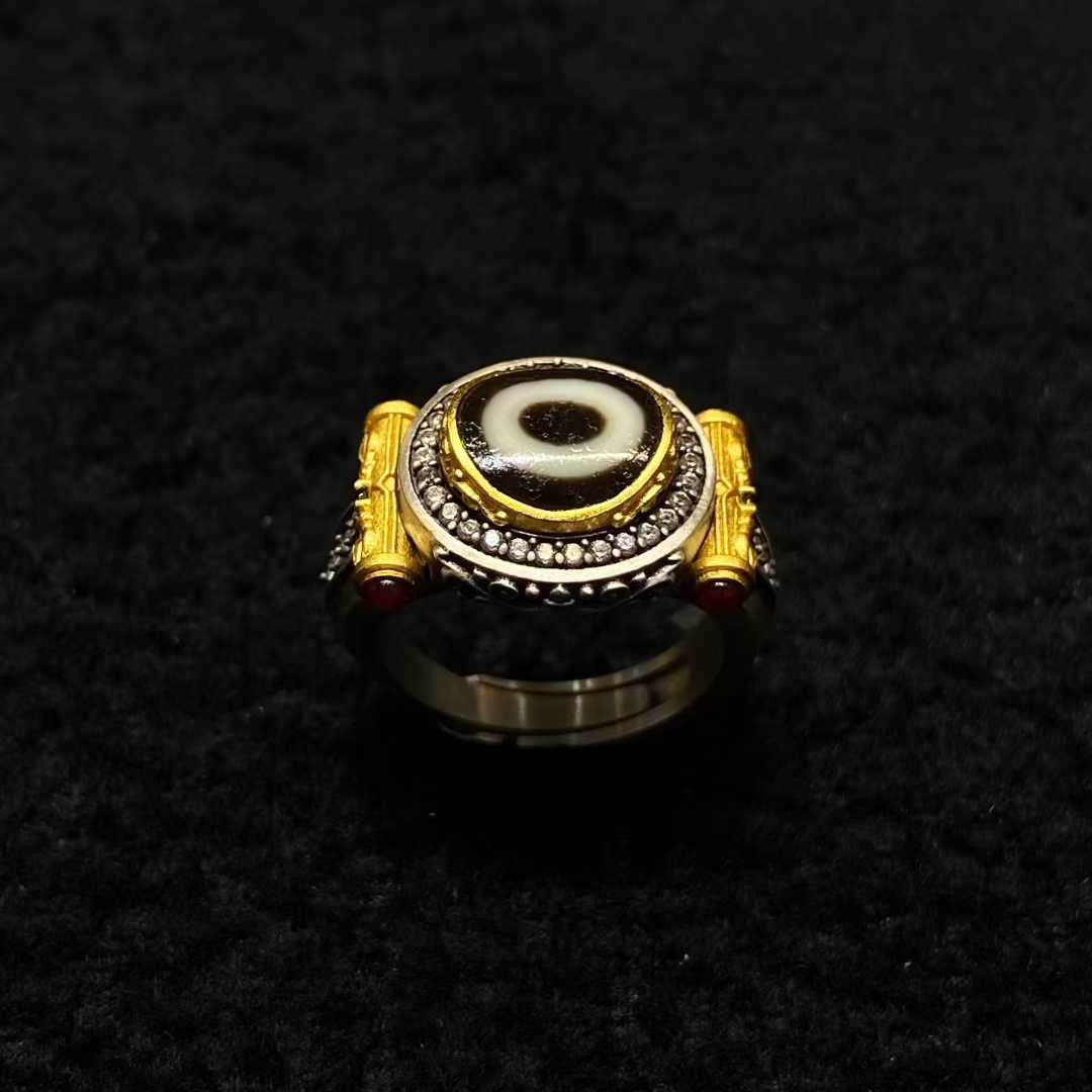 Meticulously inlaid ritual vajra ring in S925 silver demonstrates Tibetan Buddhist jewelry art, embodying enlightenment through sacred symbolic craftsmanship.